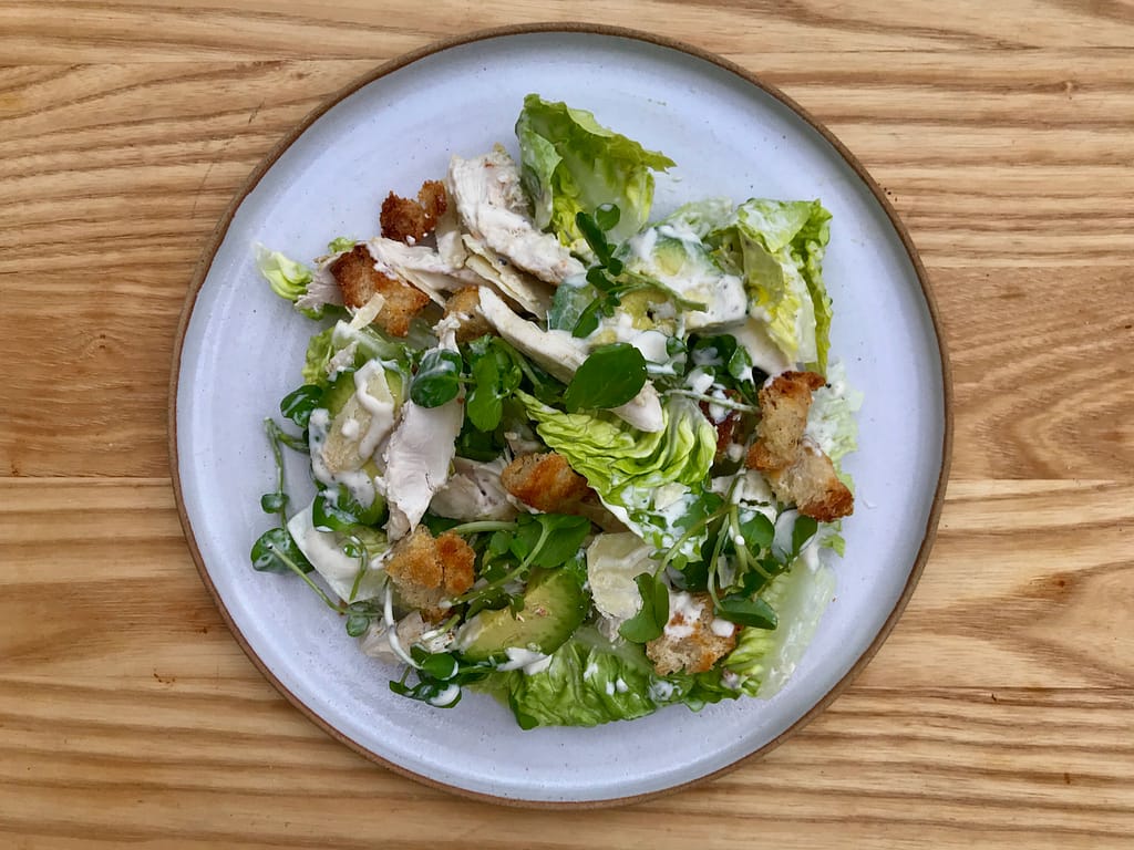 Chicken and avocado Caesar salad